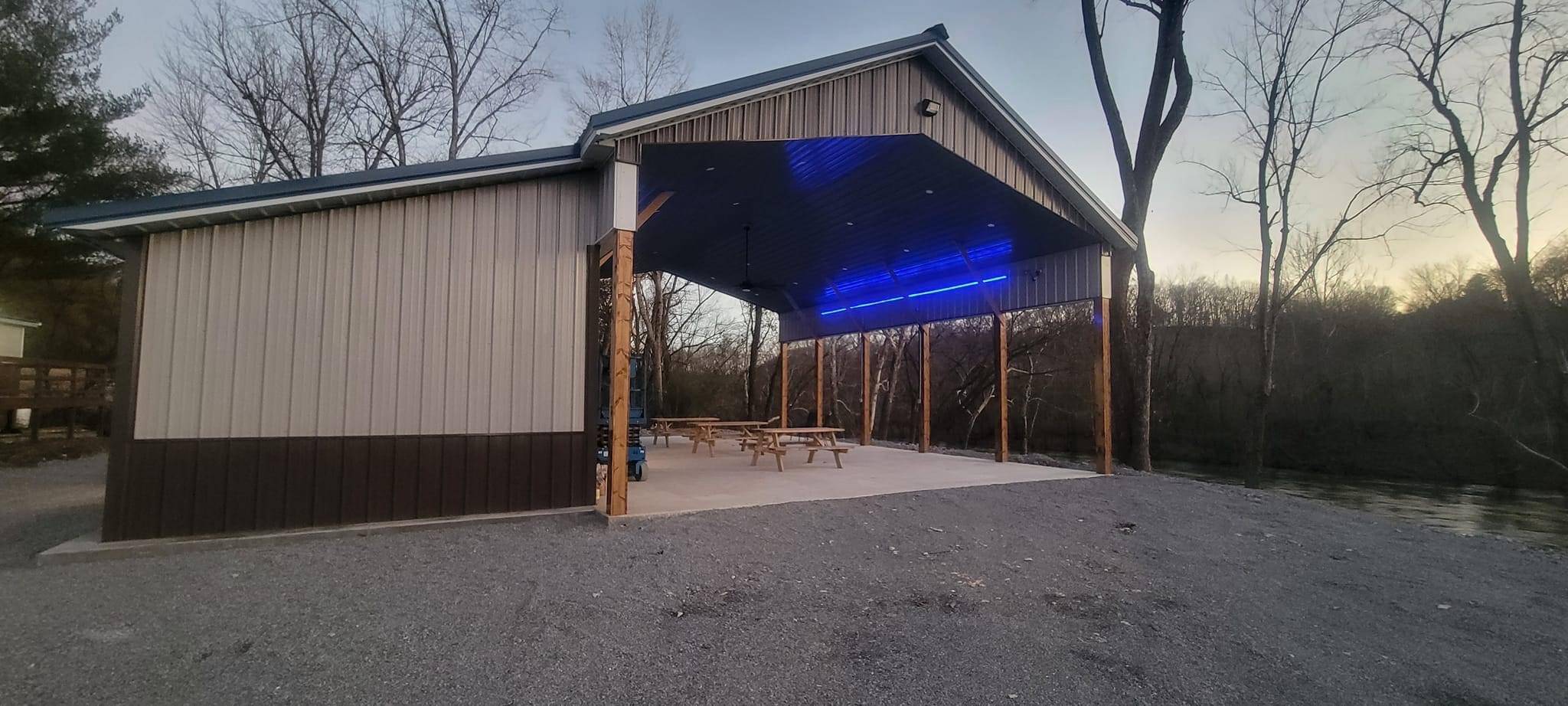 Paddle Trail Campground logo Pavillion lights table